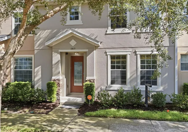 Photo 1 of Townhouse for sale at 13613 Eridanus Dr, Orlando, FL 32828 | MLS# O6437453 | Listing updated on 2026-09-23