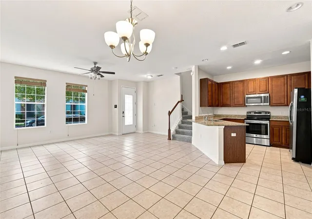 Photo 2 of Townhouse for sale at 13613 Eridanus Dr, Orlando, FL 32828 | MLS# O6437453 | Listing updated on 2026-09-23