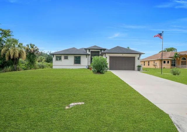 Photo 1 of Single family home for sale at 609 Clayton Ave, Lehigh Acres, FL 33972 | MLS# A4704387 | Listing updated on 2026-09-01