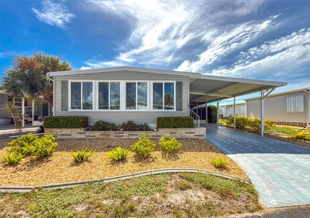 Photo 2 of Manufactured home for sale at 13 S Marina Plz, Englewood, FL 34223 | MLS# C7530108 | Listing updated on 2026-08-30