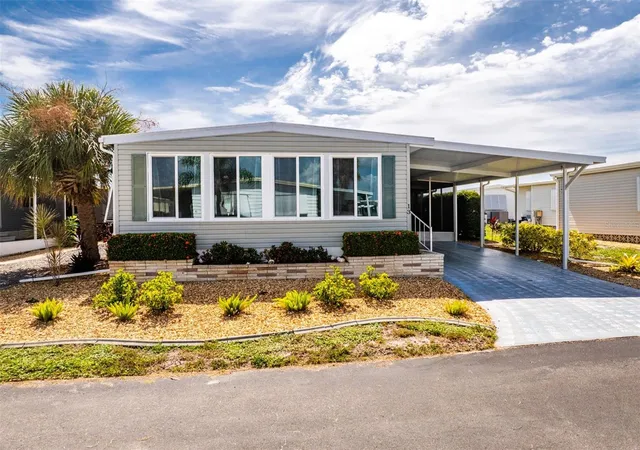 Photo 3 of Manufactured home for sale at 13 S Marina Plz, Englewood, FL 34223 | MLS# C7530108 | Listing updated on 2026-08-30