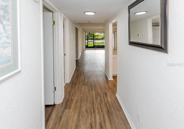 Listing Photo 2 - Condo for sale in building located at 7623 Radcliffe Cir, Port Richey, FL 34668 - Unit #111A