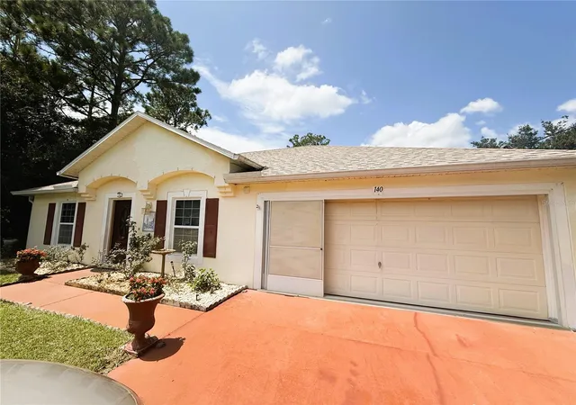Photo 2 of Single family home for sale at 140 Persimmon Dr, Palm Coast, FL 32164 | MLS# FC321067 | Listing updated on 2026-10-09