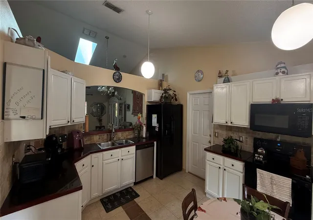 Photo 4 of Single family home for sale at 140 Persimmon Dr, Palm Coast, FL 32164 | MLS# FC321067 | Listing updated on 2026-10-09