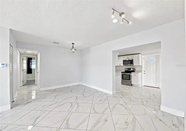 Photo 3 of Single family home for sale at 7805 Winston Ln, Tampa, FL 33615 | MLS# TB8543580 | Listing updated on 2026-09-23