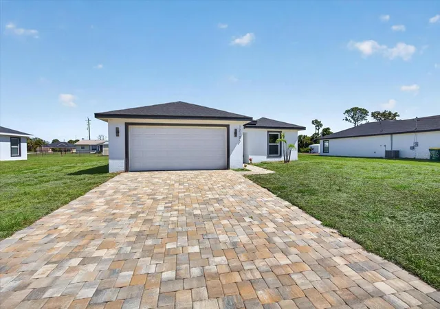 Photo 1 of Single family home for sale at 12106 Clarendon Ave, Port Charlotte, FL 33981 | MLS# TB8543616 | Listing updated on 2026-09-04