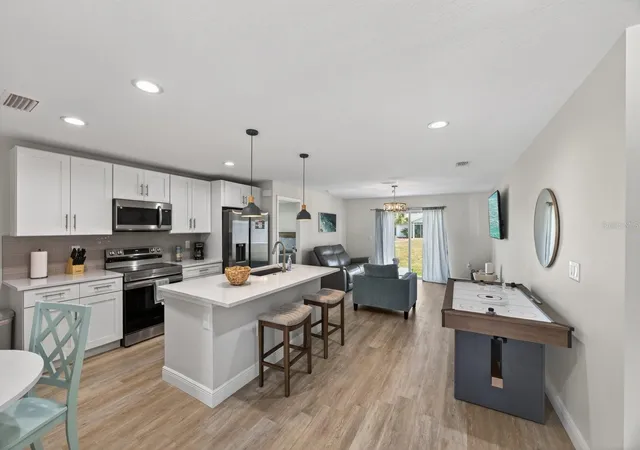 Photo 3 of Single family home for sale at 12106 Clarendon Ave, Port Charlotte, FL 33981 | MLS# TB8543616 | Listing updated on 2026-09-04