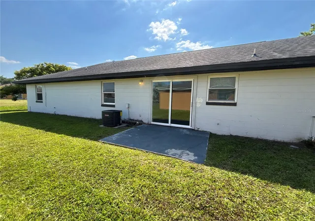 Photo 3 of Multi family home for sale at 504 Blackbird Ln #A, Kissimmee, FL 34759 | MLS# TB8543646 | Listing updated on 2026-09-26