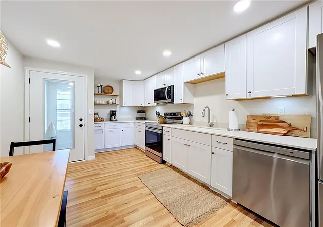 Photo 2 of Multi family home for sale at 202 Peacock Unit B Ln #B, Holmes Beach, FL 34217 | MLS# A4704456 | Listing updated on 2026-09-22