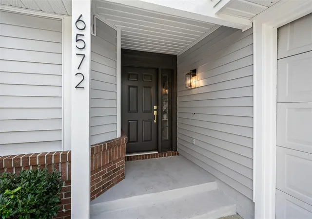 Photo 2 of Single family home for sale at 6572 Abercrombie Ct, Orlando, FL 32835 | MLS# O6437667 | Listing updated on 2026-09-13