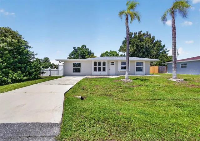 Photo 1 of Single family home for sale at 312 Reading St Nw, Port Charlotte, FL 33952 | MLS# A4704491 | Listing updated on 2026-09-12