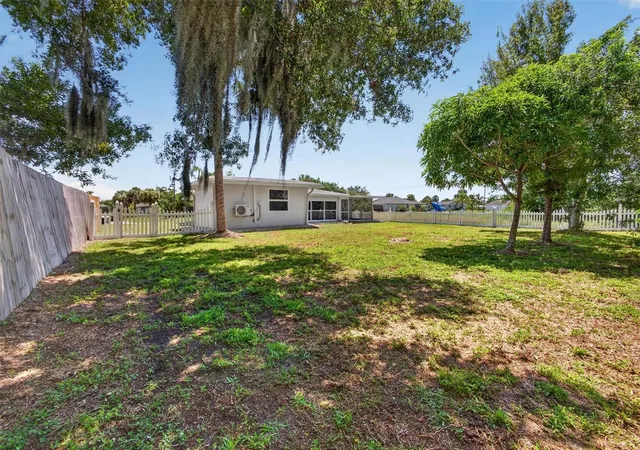 Photo 54 of Single family home for sale at 312 Reading St Nw, Port Charlotte, FL 33952 | MLS# A4704491 | Listing updated on 2026-09-12