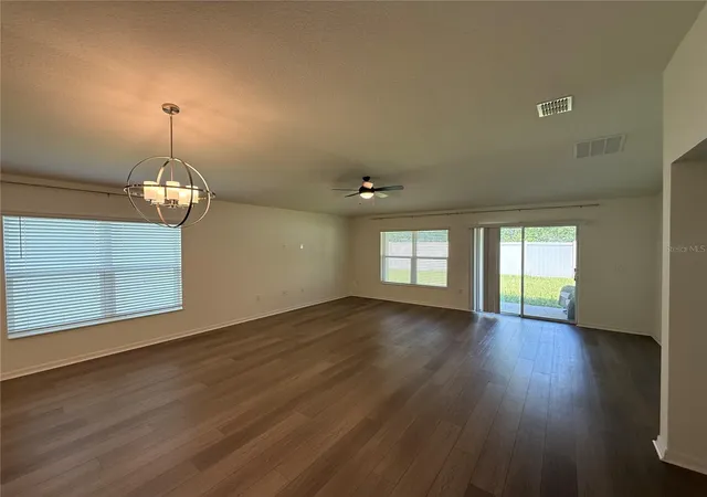 Photo 2 of Single family home for sale at 13085 Thatch Palm Wy, Orlando, FL 32828 | MLS# O6437684 | Listing updated on 2026-10-06