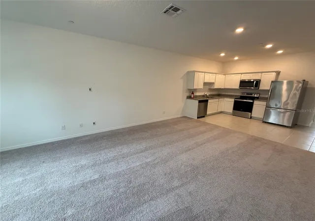 Photo 3 of Townhouse for sale at 3362 Azolla St, Orlando, FL 32808 | MLS# O6437693 | Listing updated on 2026-08-30