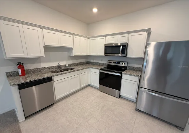 Photo 4 of Townhouse for sale at 3362 Azolla St, Orlando, FL 32808 | MLS# O6437693 | Listing updated on 2026-08-30