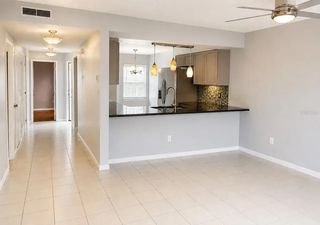 Photo 3 of Townhouse for sale at 10034 Brightfield Ct, Orlando, FL 32821 | MLS# O6437720 | Listing updated on 2026-10-10