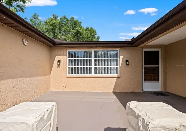 Photo 3 of Single family home for sale at 9926 Lakeside Ln, Port Richey, FL 34668 | MLS# W7889048 | Listing updated on 2026-09-06