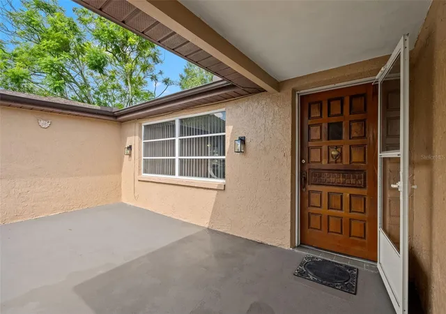 Photo 4 of Single family home for sale at 9926 Lakeside Ln, Port Richey, FL 34668 | MLS# W7889048 | Listing updated on 2026-09-06