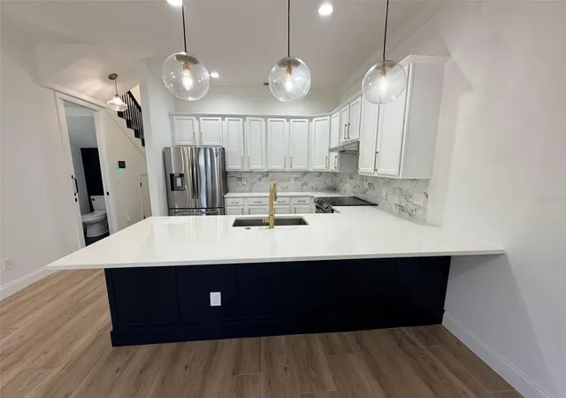 Photo 4 of Multi family home for sale at 2013 E Esther St, Orlando, FL 32806 | MLS# O6437752 | Listing updated on 2026-09-01