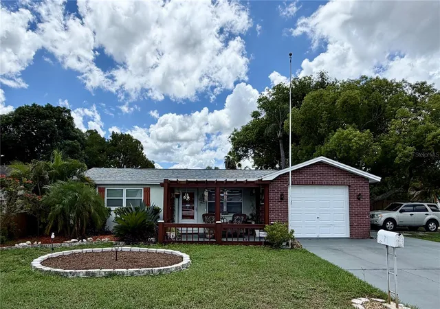 Photo 1 of Single family home for sale at 7004 Rockwood Dr, Port Richey, FL 34668 | MLS# W7889060 | Listing updated on 2026-09-02