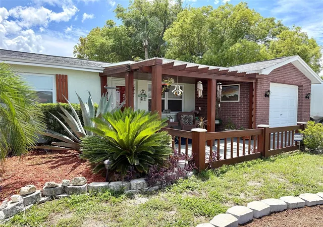 Photo 3 of Single family home for sale at 7004 Rockwood Dr, Port Richey, FL 34668 | MLS# W7889060 | Listing updated on 2026-09-02