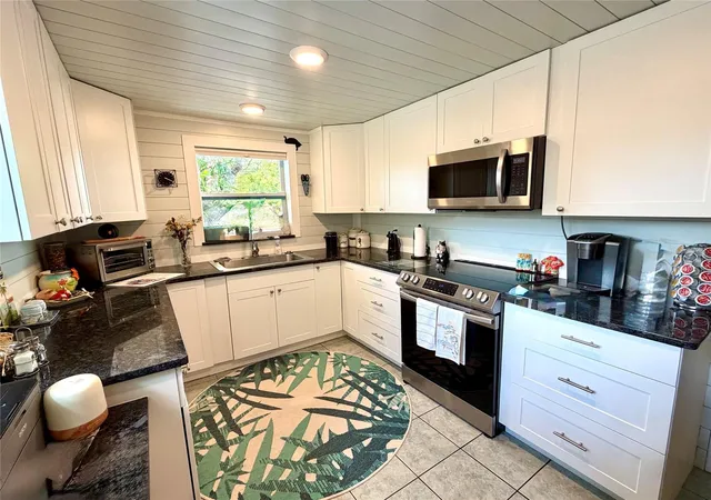 Photo 5 of Single family home for sale at 7004 Rockwood Dr, Port Richey, FL 34668 | MLS# W7889060 | Listing updated on 2026-09-02