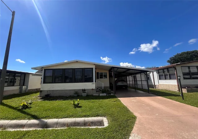 Photo 1 of Manufactured home for sale at 6458 Hollyberry Ln Ne, Winter Haven, FL 33881 | MLS# S5156633 | Listing updated on 2026-09-04
