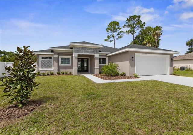 Photo 2 of Single family home for sale at 6 Burning Tree Pl, Palm Coast, FL 32137 | MLS# FC321094 | Listing updated on 2026-10-12