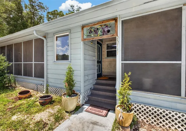 Photo 3 of Single family home for sale at 25717 Troon Ave, Sorrento, FL 32776 | MLS# O6437797 | Listing updated on 2026-09-01