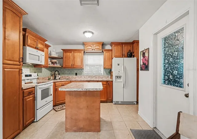 Photo 3 of Single family home for sale at 1014 Roosevelt Ave, Brooksville, FL 34604 | MLS# TB8544072 | Listing updated on 2026-10-10