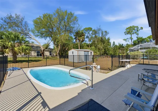 Photo 2 of Single family home for sale at 1437 Rommel St, Port Charlotte, FL 33952 | MLS# C7530185 | Listing updated on 2026-09-05