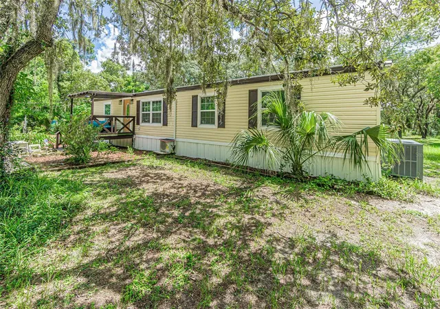 Photo 1 of Manufactured home for sale at 11420 English Walnut St, Hudson, FL 34669 | MLS# W7889078 | Listing updated on 2026-09-21