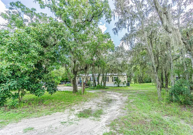 Photo 2 of Manufactured home for sale at 11420 English Walnut St, Hudson, FL 34669 | MLS# W7889078 | Listing updated on 2026-09-21