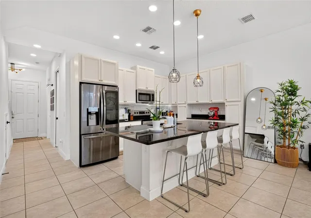 Photo 5 of Townhouse for sale at 306 Captiva Dr, Davenport, FL 33896 | MLS# O6437937 | Listing updated on 2026-09-02
