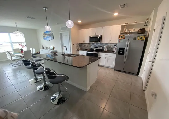 Photo 3 of Single family home for sale at 1464 Riverboat Dr, Kindred, FL 34744 | MLS# O6437941 | Listing updated on 2026-09-01