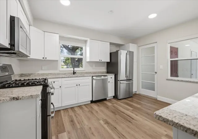 Photo 3 of Single family home for sale at 1837 Pasadena Dr, Dunedin, FL 34698 | MLS# W7889080 | Listing updated on 2026-10-10