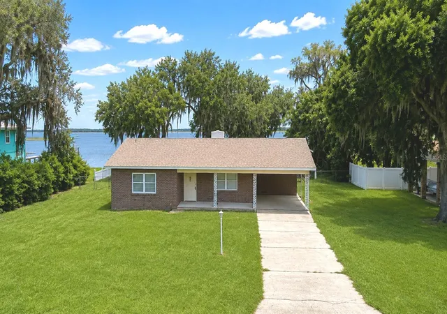Photo 1 of Single family home for sale at 214 N Lake Reedy Blvd, Frostproof, FL 33843 | MLS# K4903747 | Listing updated on 2026-09-01