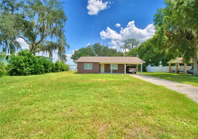 Photo 2 of Single family home for sale at 214 N Lake Reedy Blvd, Frostproof, FL 33843 | MLS# K4903747 | Listing updated on 2026-09-01