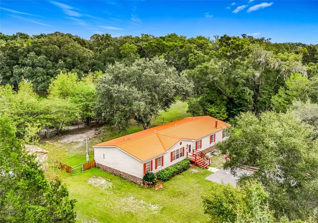 Photo 3 of Manufactured home for sale at 13906 Sw 132nd Place, Archer, FL 32618 | MLS# TB8544207 | Listing updated on 2026-09-02
