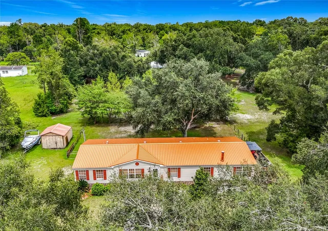 Photo 3 of Manufactured home for sale at 13906 SW 132nd Place, Archer, FL 32618 | MLS# TB8544207 | Listing updated on 2026-09-02