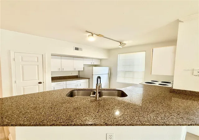 Photo 3 of Condo for sale at 6356 Raleigh St #1503, Orlando, FL 32835 | MLS# O6438006 | Listing updated on 2026-09-02