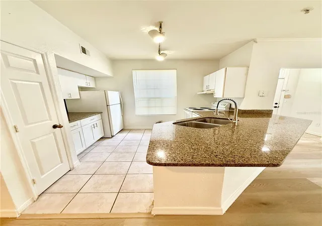 Listing Photo 4 - Condo for sale in building located at 6356 Raleigh St, Orlando, FL 32835 - Unit #1503