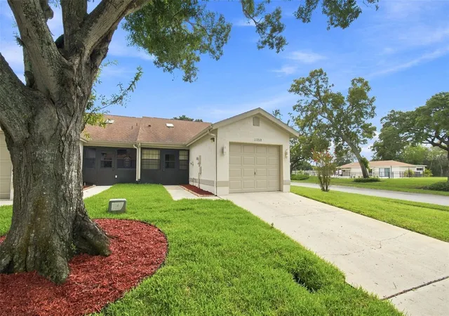 Photo 1 of Single family home for sale at 11712 Spring Tree Ln, Port Richey, FL 34668 | MLS# TB8544269 | Listing updated on 2026-10-23