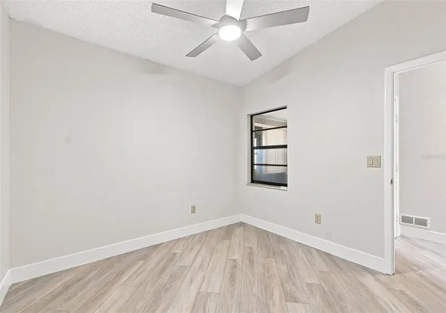 Photo 4 of House for sale at 11712 Spring Tree Ln, Port Richey, FL 34668 | MLS# TB8544269 | Listing updated on 2026-10-23