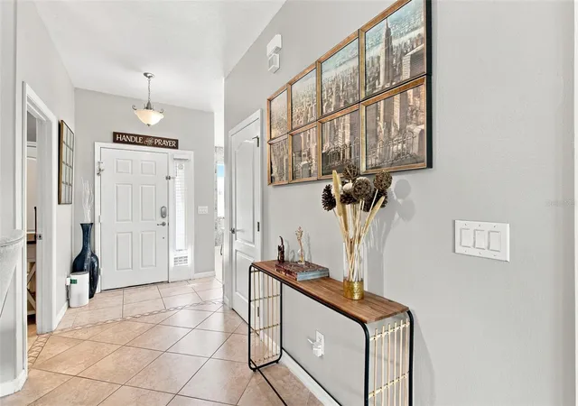 Photo 2 of Single family home for sale at 14310 Queenside St, Orlando, FL 32824 | MLS# O6438074 | Listing updated on 2026-09-13