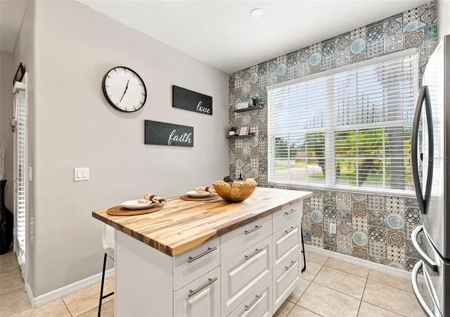 Photo 4 of Single family home for sale at 14310 Queenside St, Orlando, FL 32824 | MLS# O6438074 | Listing updated on 2026-09-13