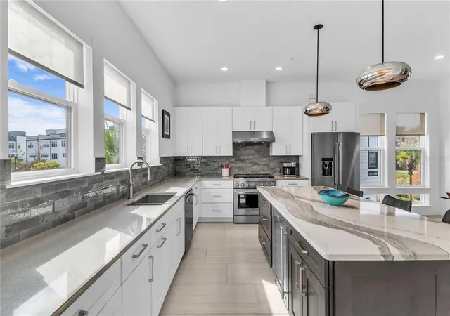 Photo 3 of Townhouse for sale at 2402 Addalia Aly, Orlando, FL 32804 | MLS# O6438106 | Listing updated on 2026-09-08