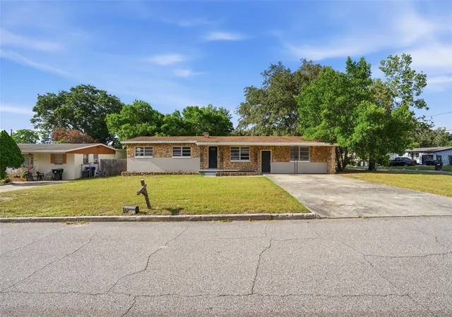 Photo 2 of Single family home for sale at 5501 Perrine Dr, Orlando, FL 32808 | MLS# O6438135 | Listing updated on 2026-09-05
