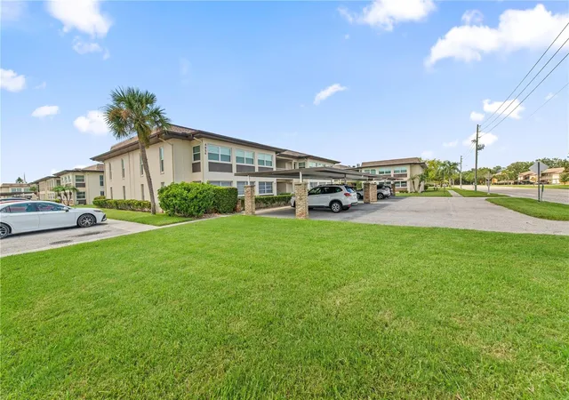 Photo 2 of Condo for sale at 4854 Marine Pkwy #101, New Port Richey, FL 34652 | MLS# A4704709 | Listing updated on 2026-09-02