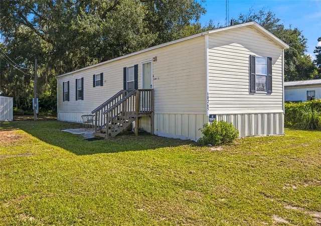 Photo 1 of Manufactured home for sale at 10265 Se 165th Place, Summerfield, FL 34491 | MLS# OM731464 | Listing updated on 2026-09-04